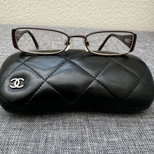 Chanel bronze colored frame glasses. With case.Put your own prescription in them